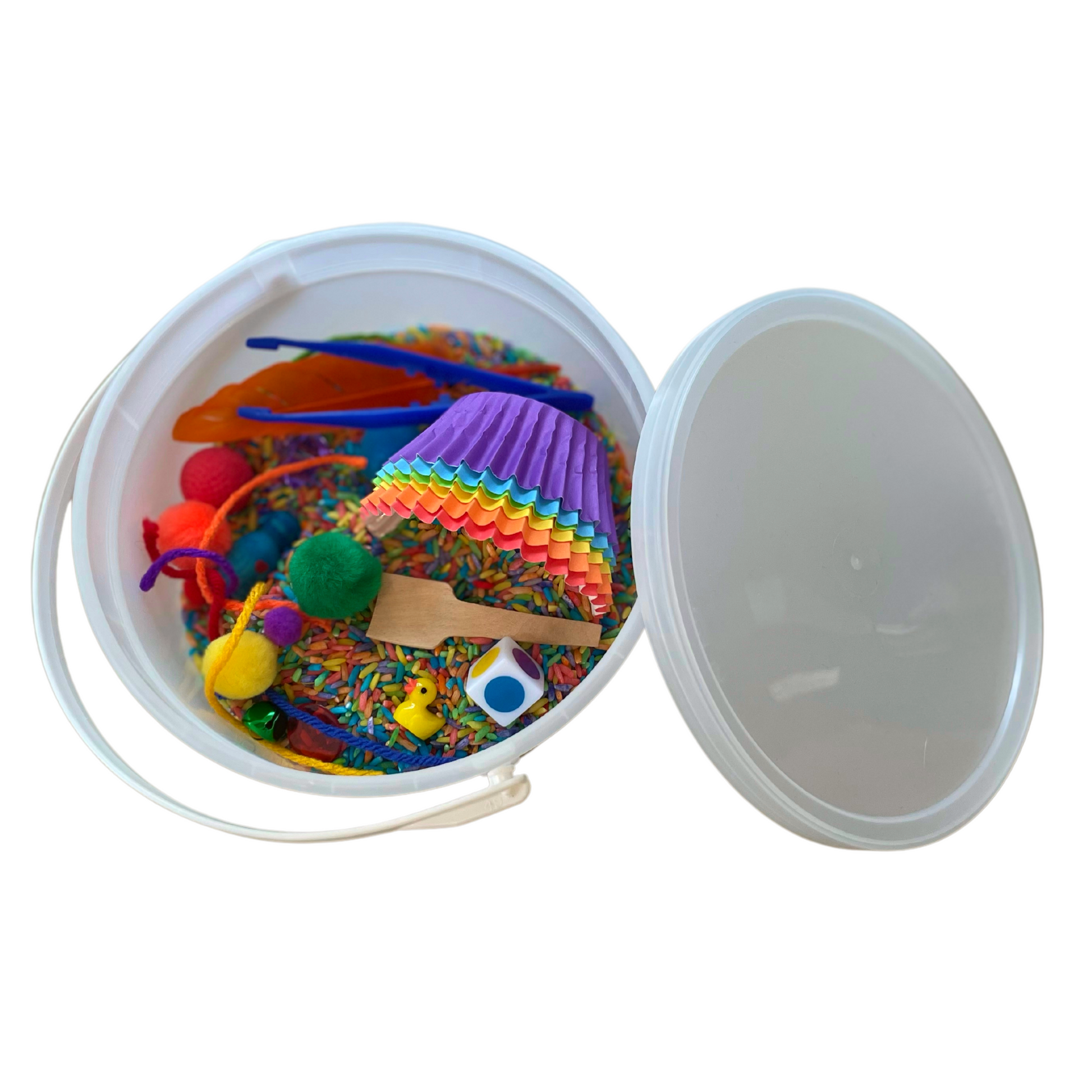 Colors Kit comes with dyed dry rice, colored baking cups, trinkets, tools, and accessories, as well as custom PlayMat and parent Sense of Help, all in our Play Pail.